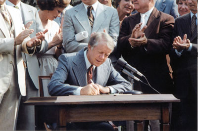 President Carter signing Act creating CRNRA
