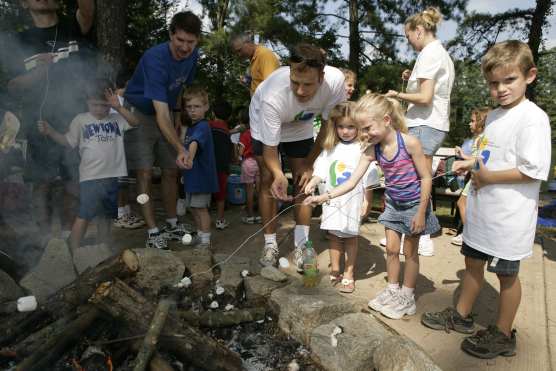 Kids Roasting Marshmallows at the Chattahoochee River Summer Festival.