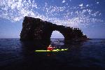 Anacapa Island kayaker with Arch Rock