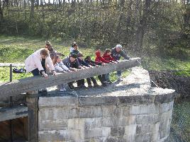 kids opening lock gate