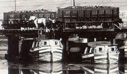 Historic photo of canal boats and mules