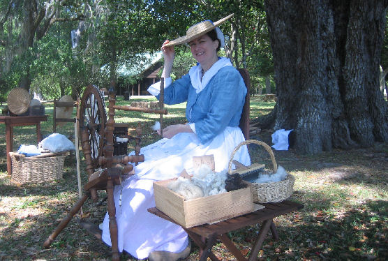 Suzanne Collins of the Carolina Ladies Aide Society spins thread in period costume during Colonial Days 2008.