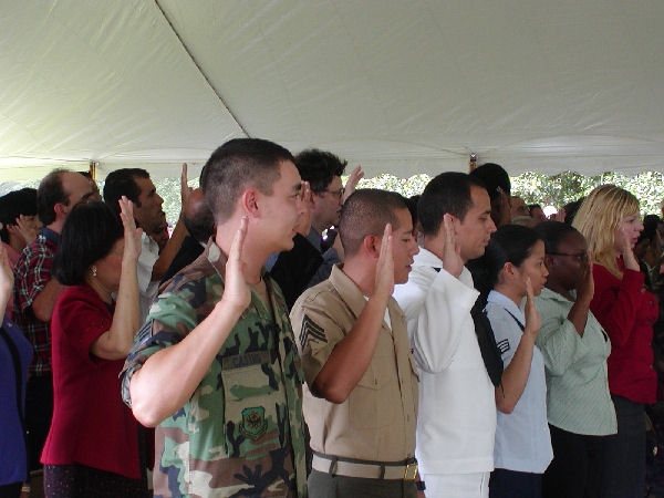 New US citizens take the Oath of Citizenship.