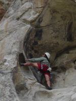 Climber working for position on Bath Rock Climber working for position on Bath Rock