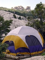 Colorful tent pitched at campsite Colorful tent pitched at campsite