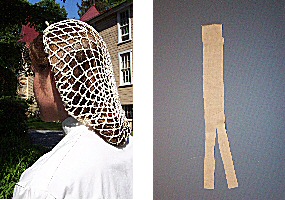 Student wearing a snood over hair and sample of bandage made for school report presentation.