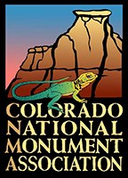 Logo with line drawing of lizard in front of rock formation and the words Colorado National Monument Association
