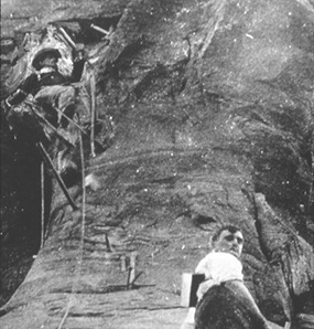 John Otto climbs Independence Monument in 1911