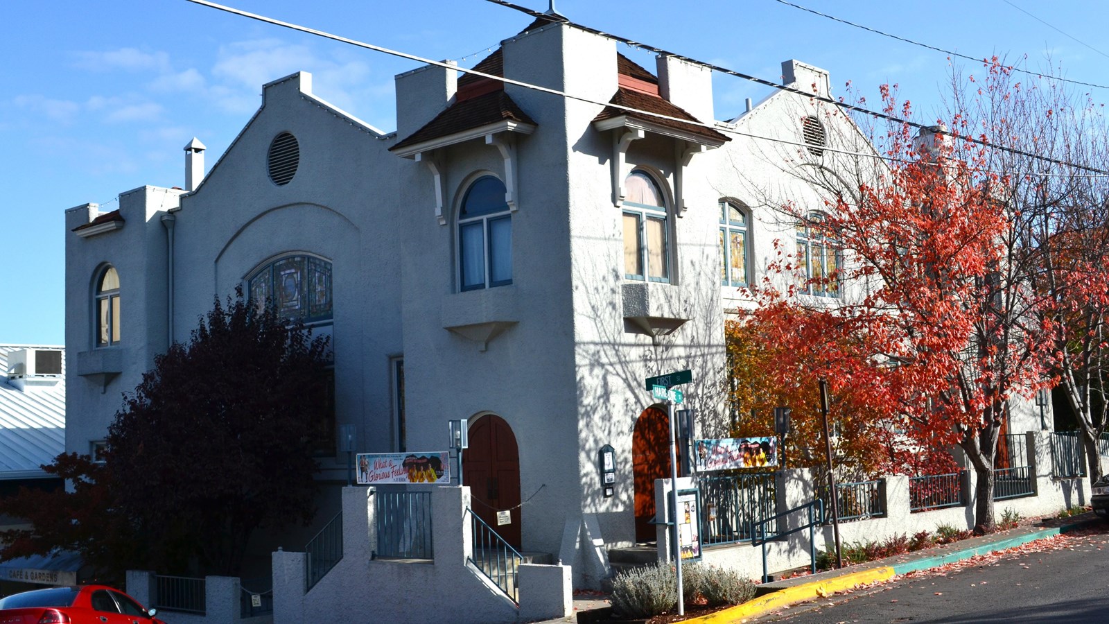 Modest white church building.