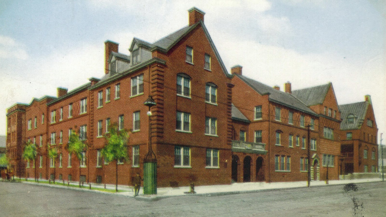 colored postcard view of the exterior of the Hull House complex