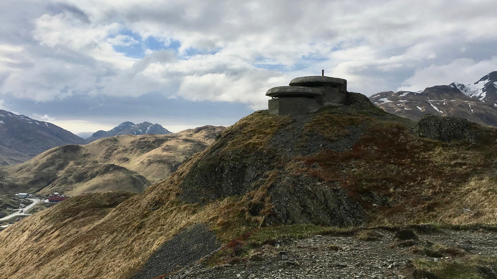A cement WWII lookout on top of a sea cliff on Amaknak Island, Alaska.