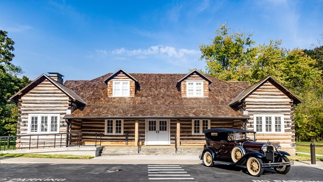 Knob Creek Tavern Visitor Center exterior - large log house