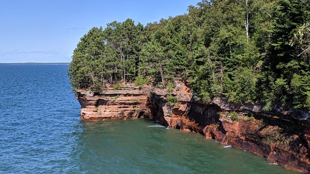 View of the sea caves from the Mainland Trail.