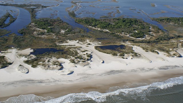 aerial view of Assateague Island from beach to bay