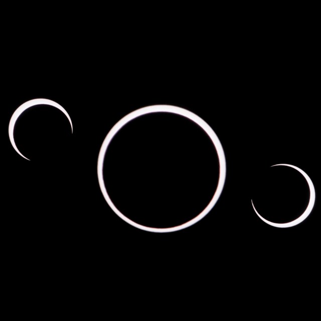 A sequence showing the sun slowly being eclipsed by the moon.