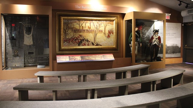 Image of seating, painting, and museum exhibits