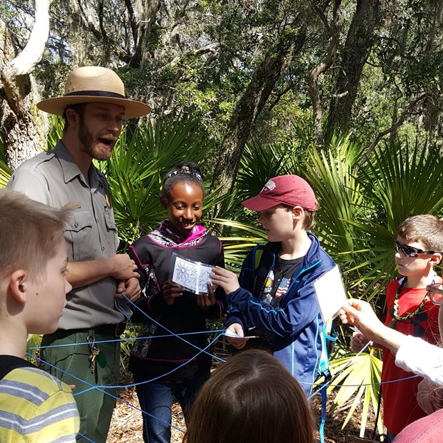 A ranger leads an educational activity