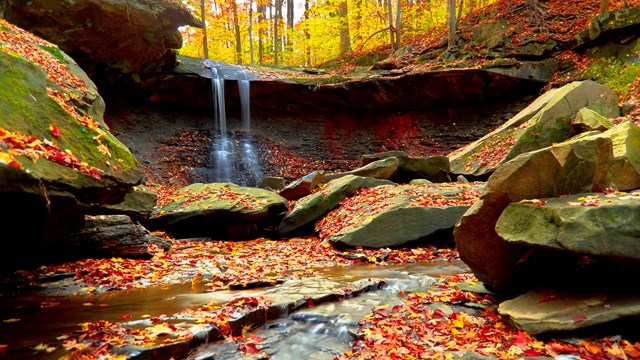 A scenic fall photo of Blue Hen Falls. 
