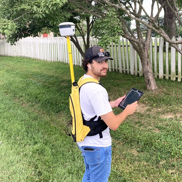 Intern with GIS Equipment