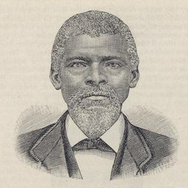 A shoulder portrait engraving of a African American man wearing a suit. 