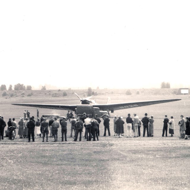Historic photograph of ANT-25 aircraft landing at Pearson Field.