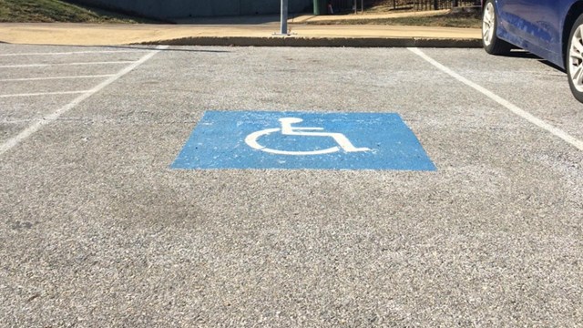 An accessible parking spot marked with the International Symbol of Access