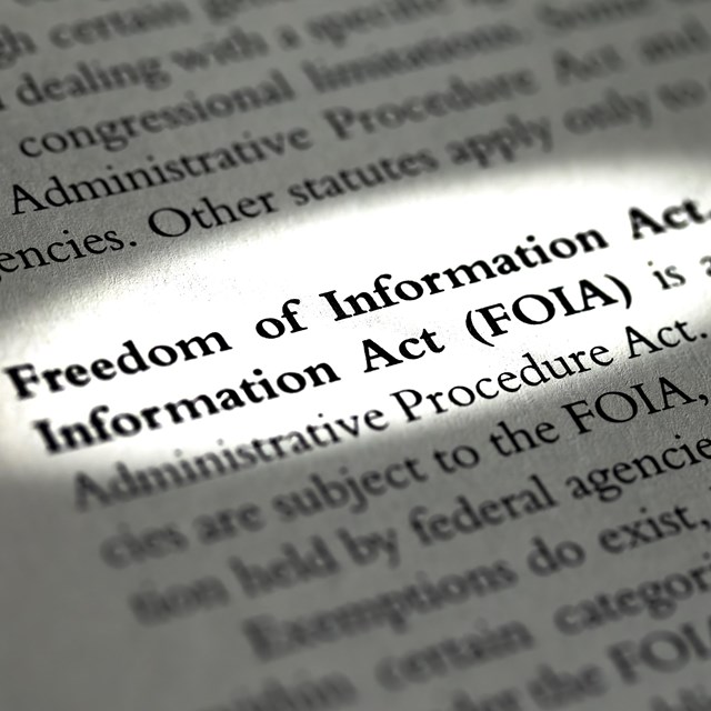 A close up of a page in a law book that highlights the Freedom of Information Act section.