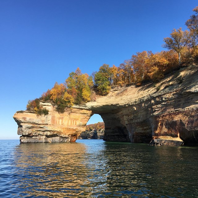 Sea arch in sandstone over Lake Superior at Picture Rocks National Park