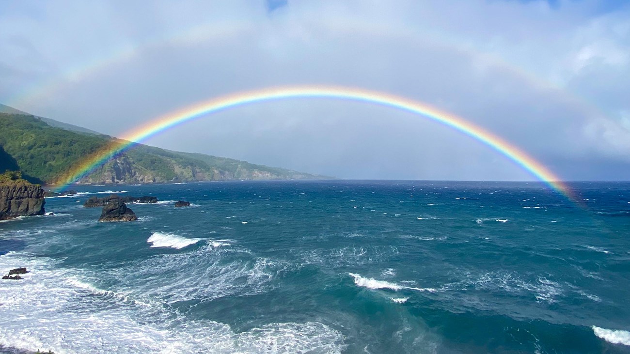 double rainbow over ocean