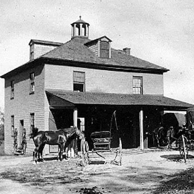 Hampton Carriage House (built c. 1850, image c. 1897), location of religious services led by Eliza R