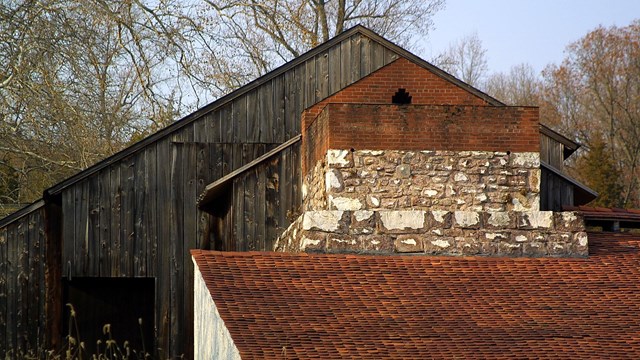 View of top of furnace stack connected to Bridge House and Cast House.