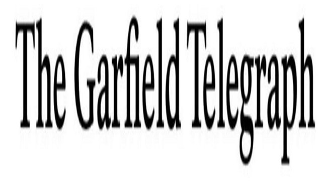 words say The Garfield Telegraph
