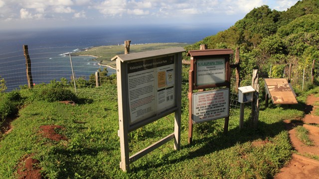 Two informational signs at an overlook