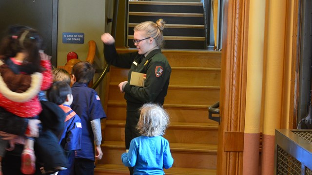 A ranger talks with kids and parents at the Calumet Visitor Center.