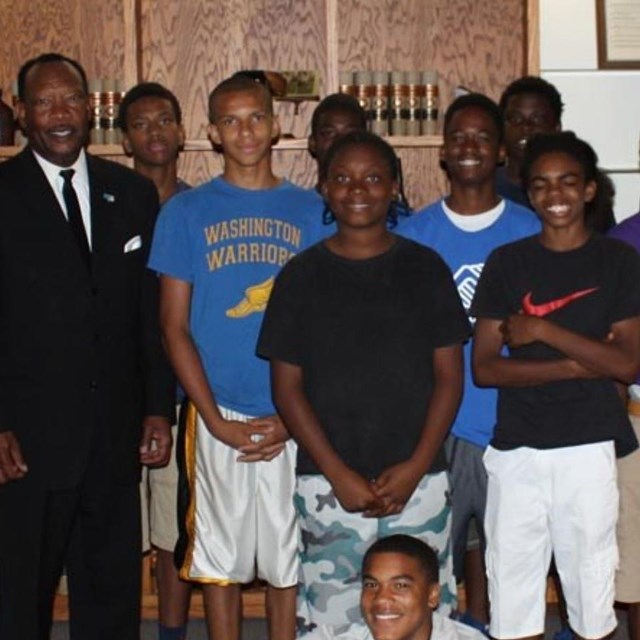 Members of the Boys and Girls stand by Lincoln and Martin Luther King Jr. actors