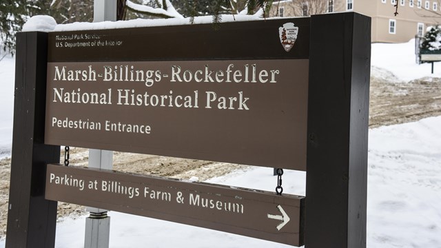 sign at front entrance of park reads "marsh-billings-rockefeller national historical Park"