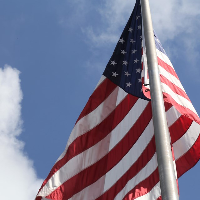 An American flag waving in the wind.