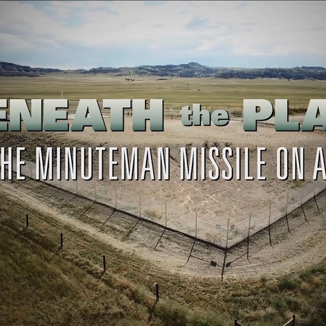 film title over a plains landscape with a missile silo.