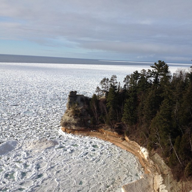 Frozen Lake Superior and Miners Castle rock formation 