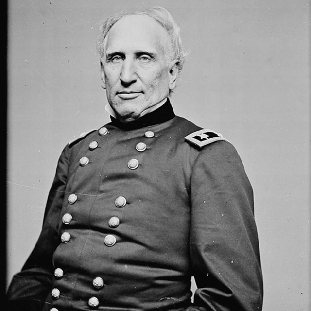 black and white photograph of a man in a us military uniform from the 19th century