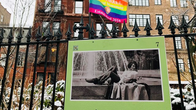 A sign from the fence exhibit at Christopher Park with a photo taken by Kay Tobin of Sylvia Rivera