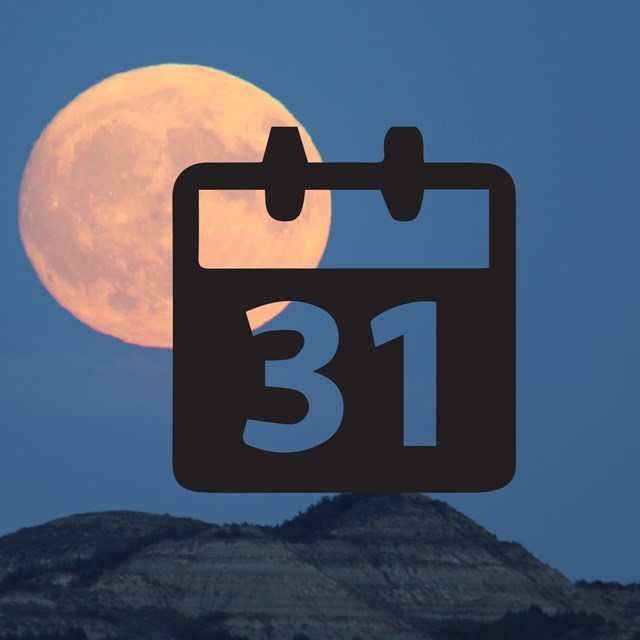 A calendar icon in front of a picture of the full moon over the badlands. 