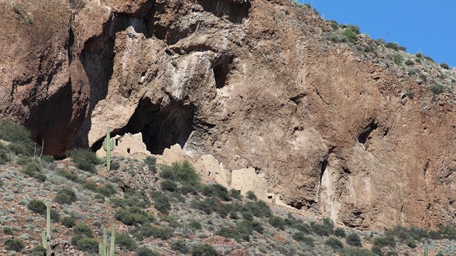 Rock escarpment on desert hillside