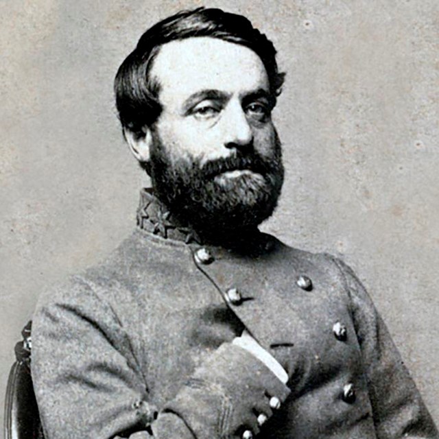 A black and white image of William Baldwin sitting in confederate uniform.