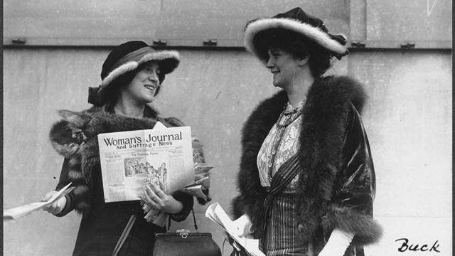 Suffragist Margaret Foley distributing the Woman's Journal 