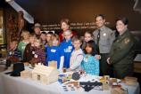 First Lady Laura Bush visits with children during her visit to the park to 