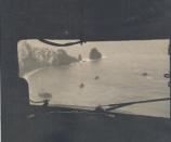A ship run aground, seen from the air