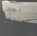 A ship run aground, seen from the air