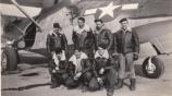 Ken Claypool and crewmembers at Oak Harbor, WA. Standing, left to right: Ensign Gonska, Navigator; Ken Claypool, Ordnance; Shaffer, Plane Captain; Ensign Cook, 1st Pilot. Kneeling, left to right: Brookover, Radio; Siebles, Radio; and McDonald, Mechanic.