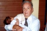 Charles Donovan holding his great-granddaughter, August 2009